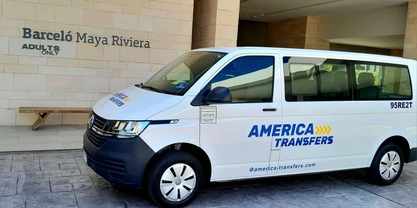 America Transfers van outside a resort entrance