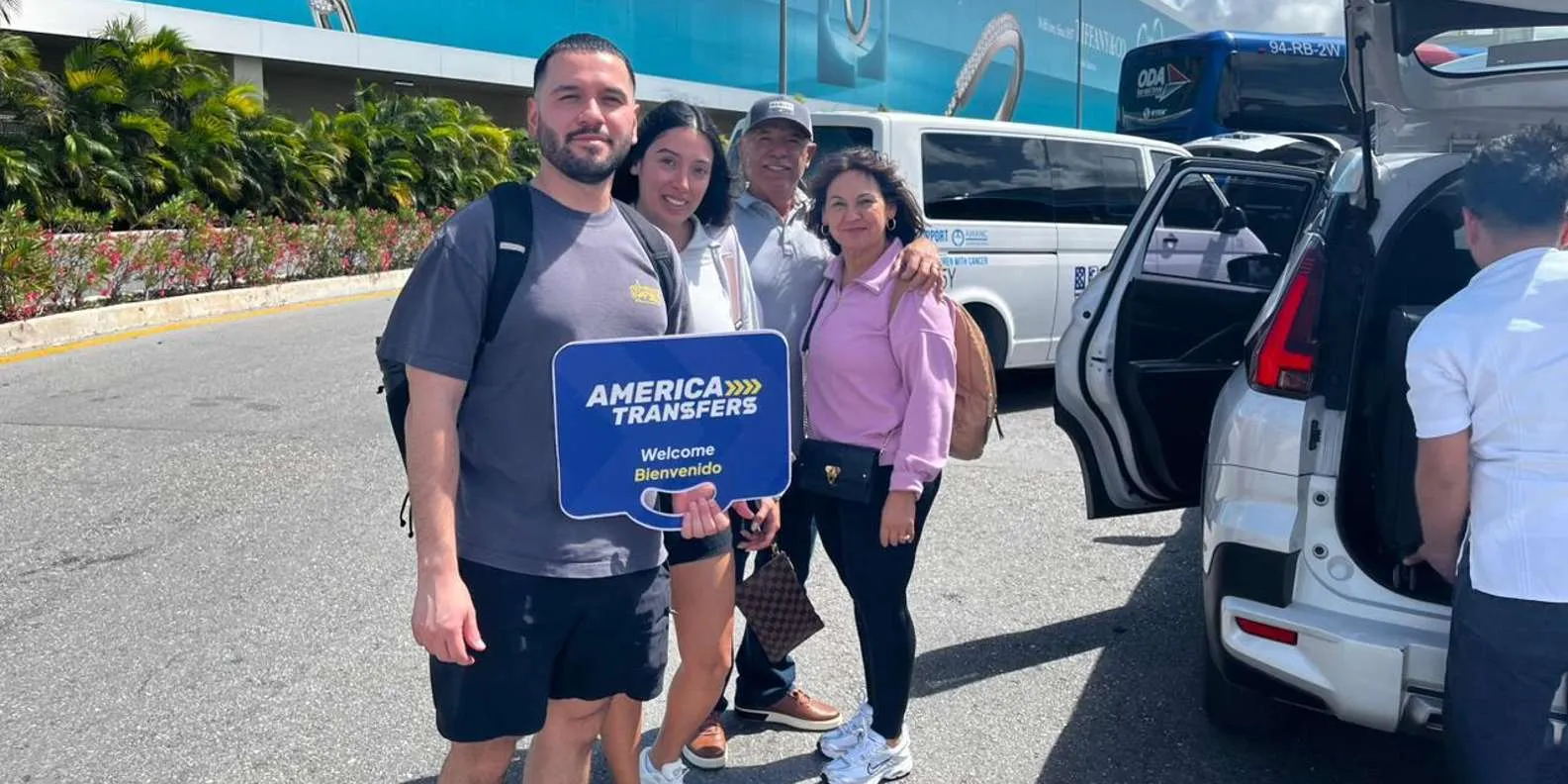 Guests beside a transfer vehicle