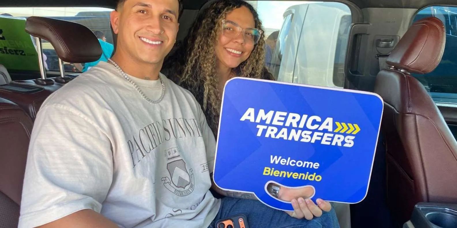 Passengers inside an America Transfers luxury vehicle